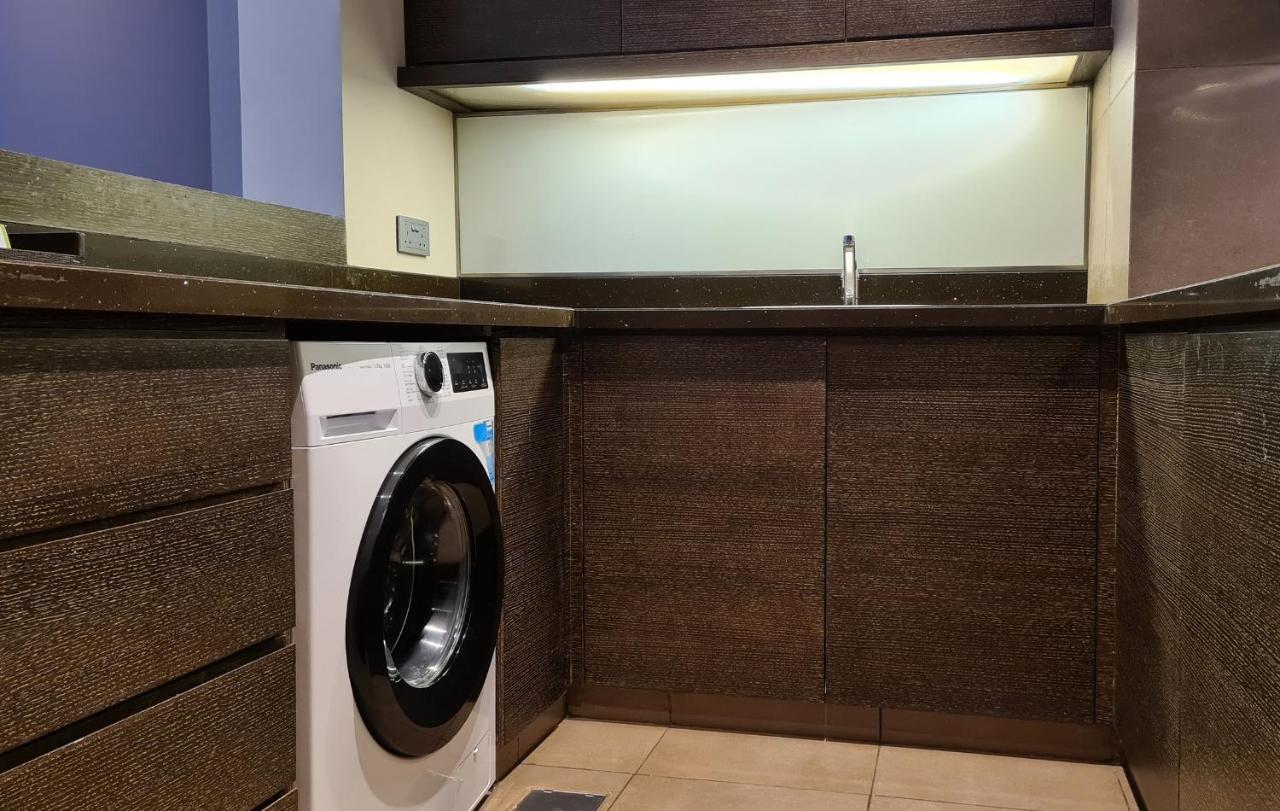 Four Points By Sheraton Al Ain Esterno foto A laundry room