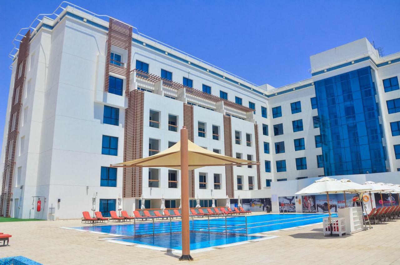 Four Points By Sheraton Al Ain Esterno foto The Nile City Towers